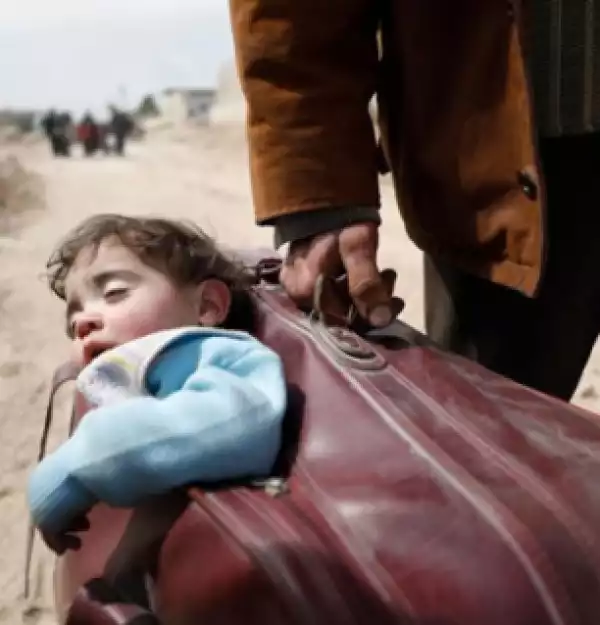 Heartbreaking: Father Flees War-Torn Syria With His Son In A Suitcase